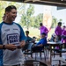 U.S. Marines and Sailors with MRF-D volunteer at a golf charity event