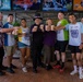 U.S. Marines and Sailors with MRF-D volunteer at a golf charity event