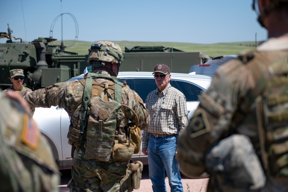 Wyoming Governor Mark Gordon and other distinguished guests visit the Camp Guernsey training area to experience a live-fire exercise with the Wyoming Army National Guard