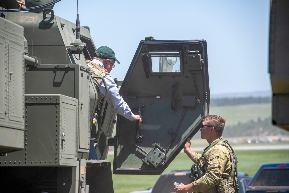 Wyoming Governor Mark Gordon and other distinguished guests visit the Camp Guernsey training area to experience a live-fire exercise with the Wyoming Army National Guard