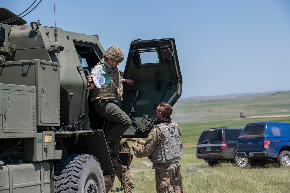 Wyoming Governor Mark Gordon and other distinguished guests visit the Camp Guernsey training area to experience a live-fire exercise with the Wyoming Army National Guard