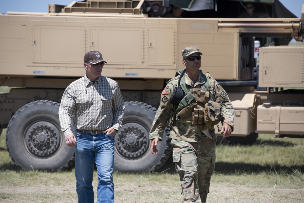 Wyoming Governor Mark Gordon and other distinguished guests visit the Camp Guernsey training area to experience a live-fire exercise with the Wyoming Army National Guard