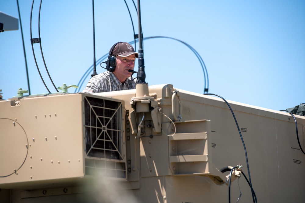 Wyoming Governor Mark Gordon and other distinguished guests visit the Camp Guernsey training area to experience a live-fire exercise with the Wyoming Army National Guard