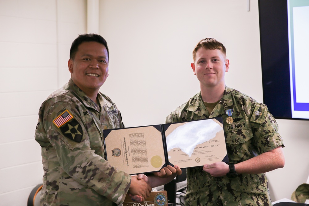 Service Members Receive the Joint Service Achievement Medal at Task Force West