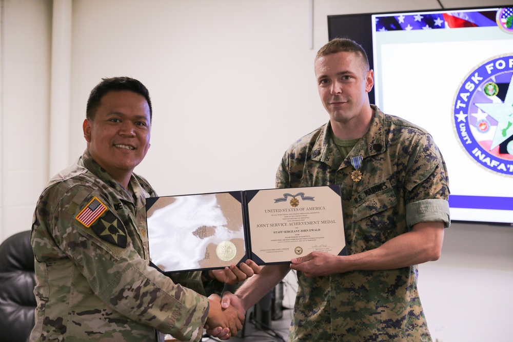 Service Members Receive the Joint Service Achievement Medal at Task Force West