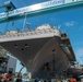 Newport News Shipbuilding contractors prepare to remove the anchor