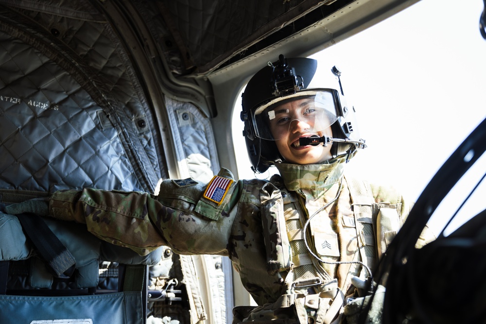 Crew Chief Sgt. Emily Quarnstrom welcomes high school teachers, principals, and school staff