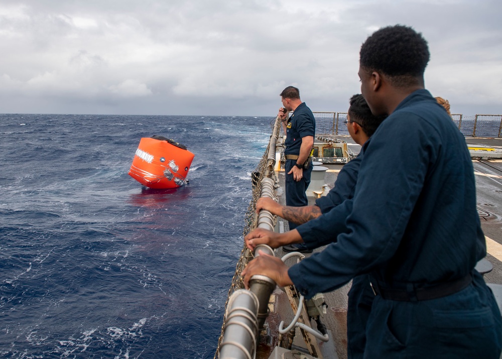 Sailors deploy a floating target aboard USS Rafael Peralta (DDG 115)