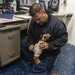 Yeoman 1st Class Luis Ramos-Perez (top), from Wichita, Kan., conducts first-aid training with Hospital Corpsman 2nd Class Adia Corbin (bottom), from Dallas, Texas