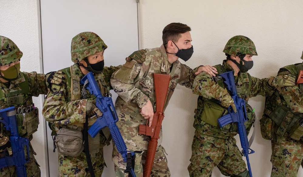 Yokota trainer instructs CQC tactics