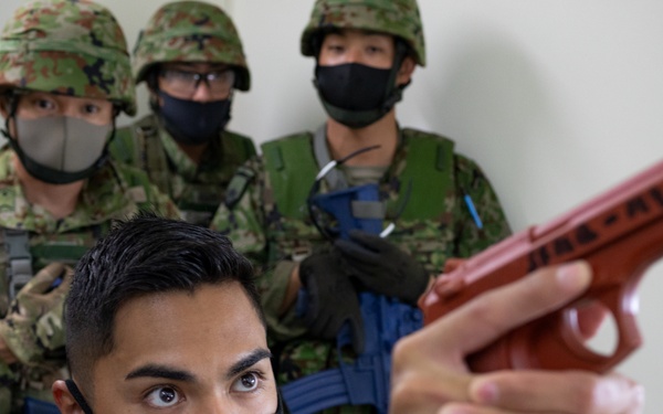 Yokota trainer instructs CQC tactics