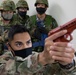 Yokota trainer instructs CQC tactics