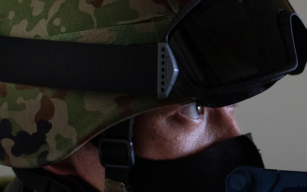 Yokota trainer instructs CQC tactics