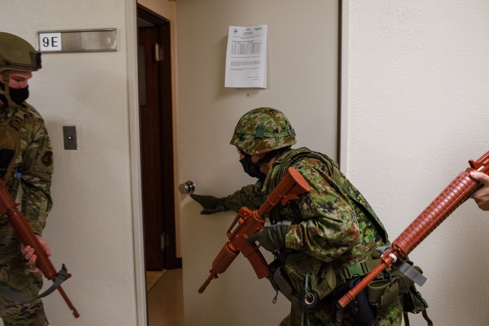 Yokota trainer instructs CQC tactics