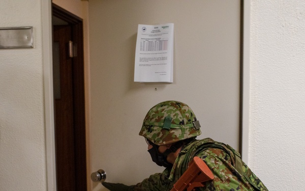 Yokota trainer instructs CQC tactics