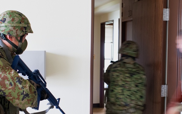 Yokota trainer instructs CQC tactics