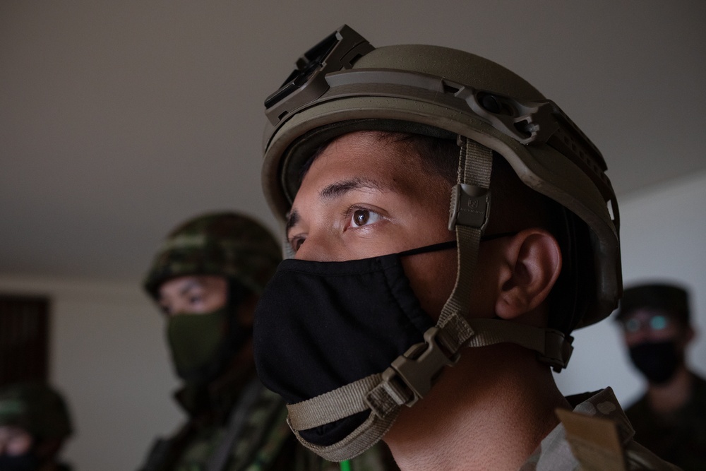 Yokota trainer instructs CQC tactics