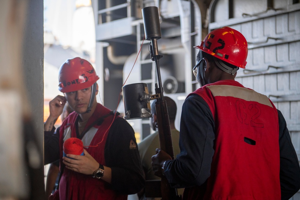 USS America conducts a replenishment-at-sea with the fleet replenishment oiler USNS Tippecanoe