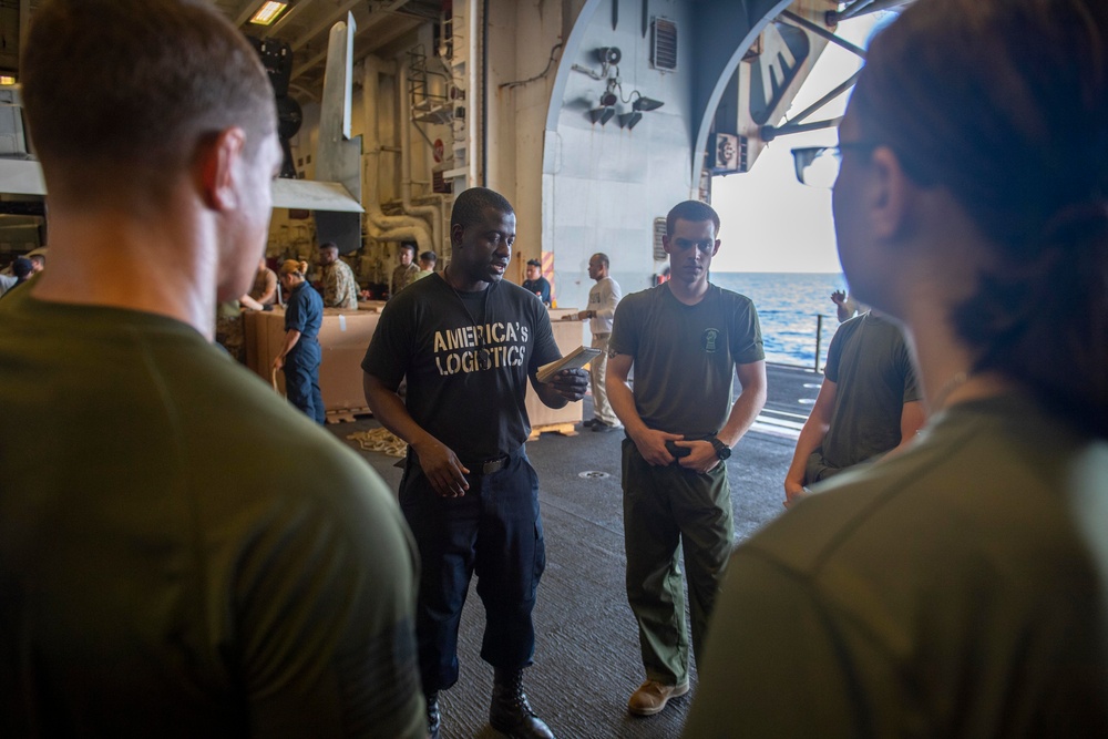 USS America conducts a replenishment-at-sea with the fleet replenishment oiler USNS Tippecanoe