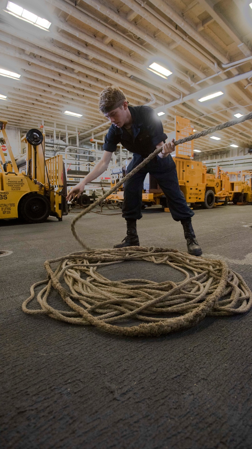 USS America conducts a replenishment-at-sea with the fleet replenishment oiler USNS Tippecanoe