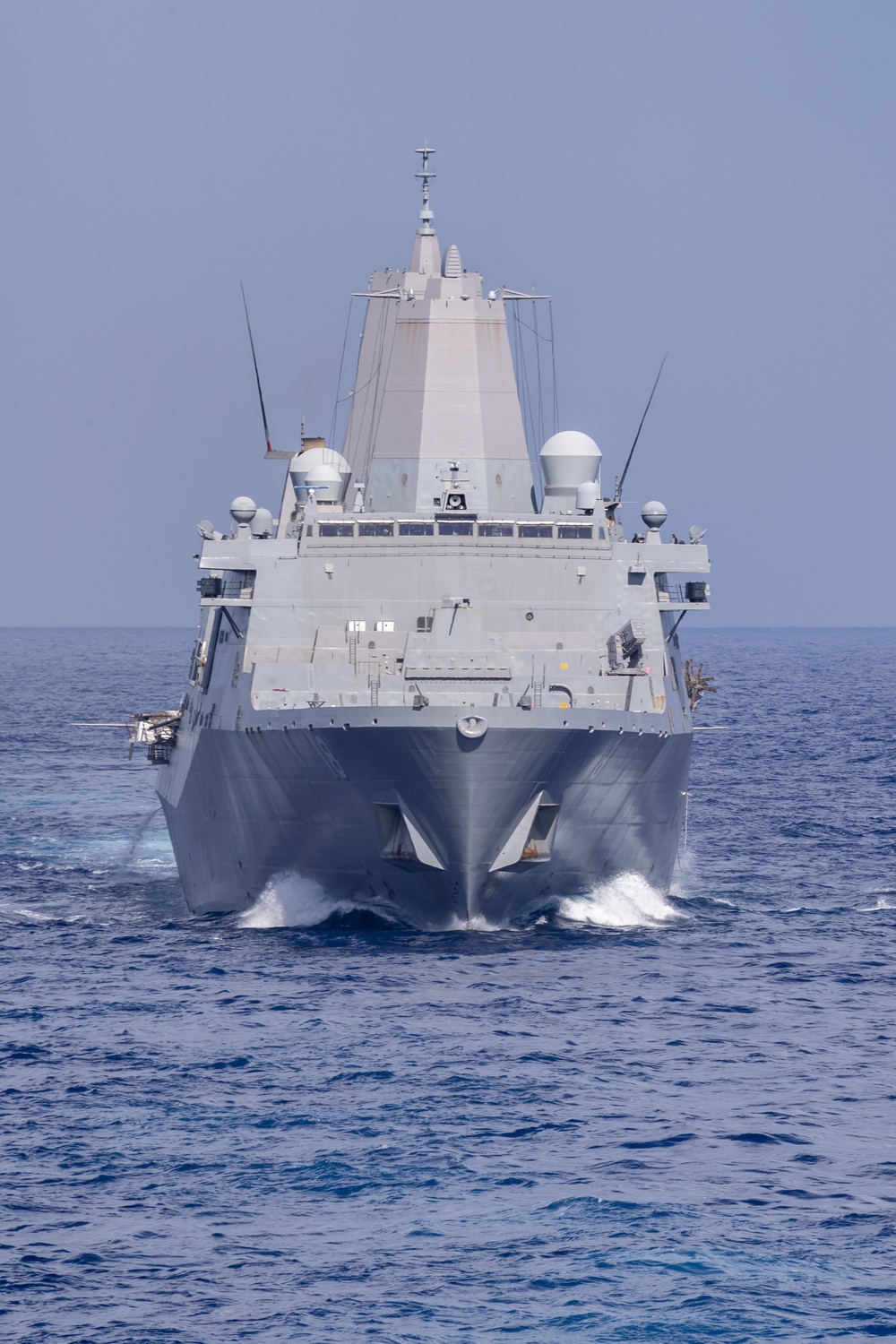 USS America conducts a replenishment-at-sea with the fleet replenishment oiler USNS Tippecanoe