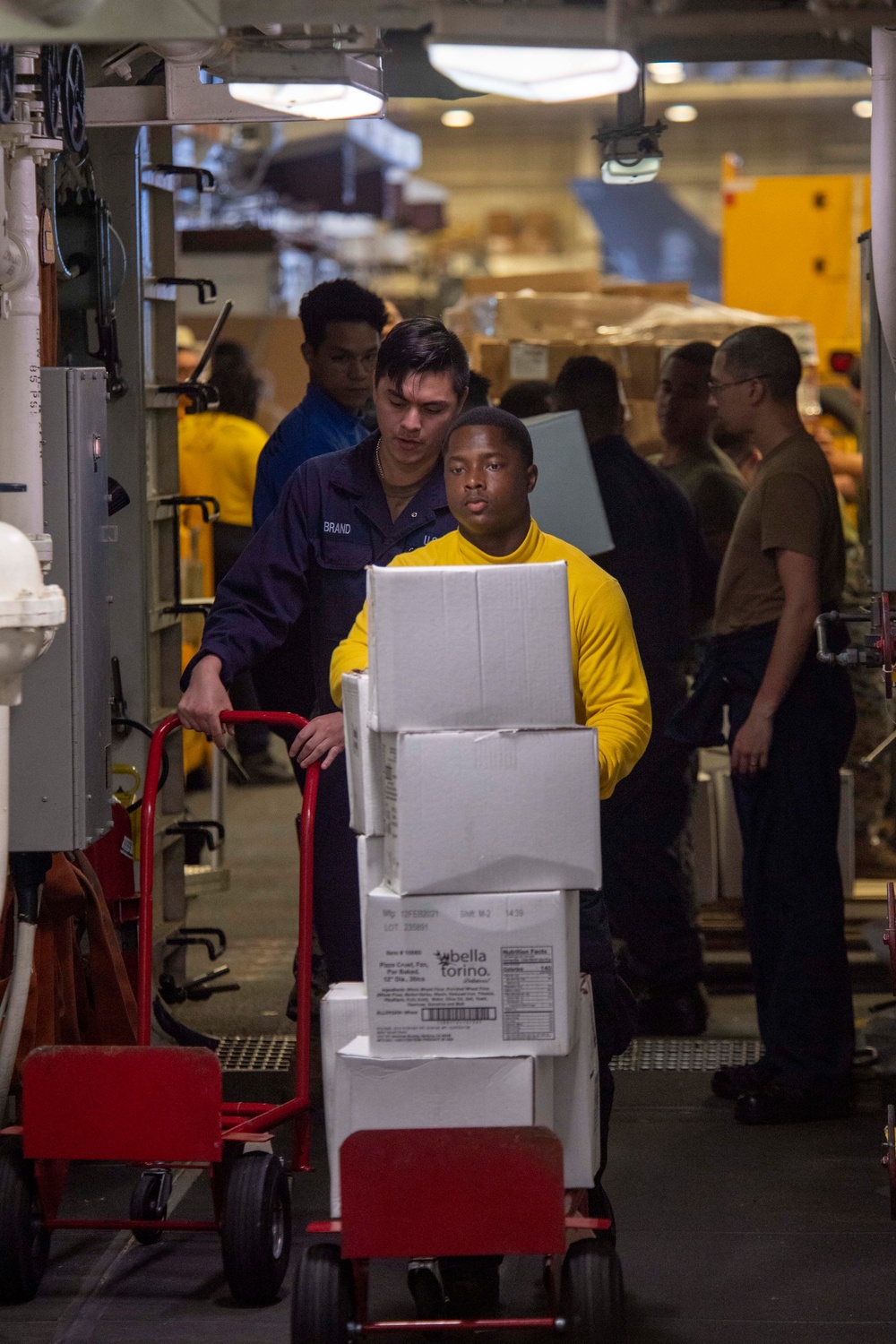 USS America conducts a replenishment-at-sea with the fleet replenishment oiler USNS Tippecanoe