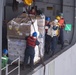 USS America conducts a replenishment-at-sea with the fleet replenishment oiler USNS Tippecanoe