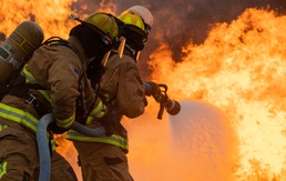 Feel The Burn: 152nd Civil Engineer Squadron firefighters participate in live burn exercise