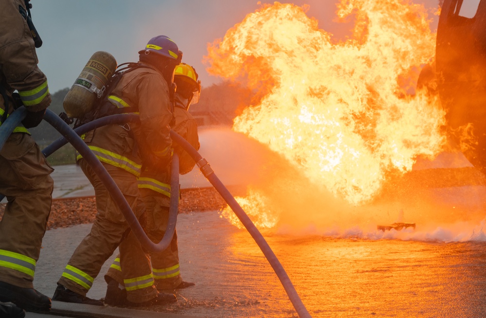 Feel The Burn: 152nd Civil Engineer Squadron firefighters participate in live burn exercise