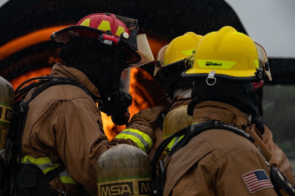Feel The Burn: 152nd Civil Engineer Squadron firefighters participate in live burn exercise