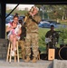 Spc. Jordan Elliff, musician with the 34th Army Band, Sidewinders serenades Lisa Fergus, from Johnston Iowa, with a with a rendition of Happy Birthday