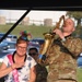 Spc. Jordan Elliff, musician with the 34th Army Band, Sidewinders serenades Lisa Fergus, from Johnston Iowa