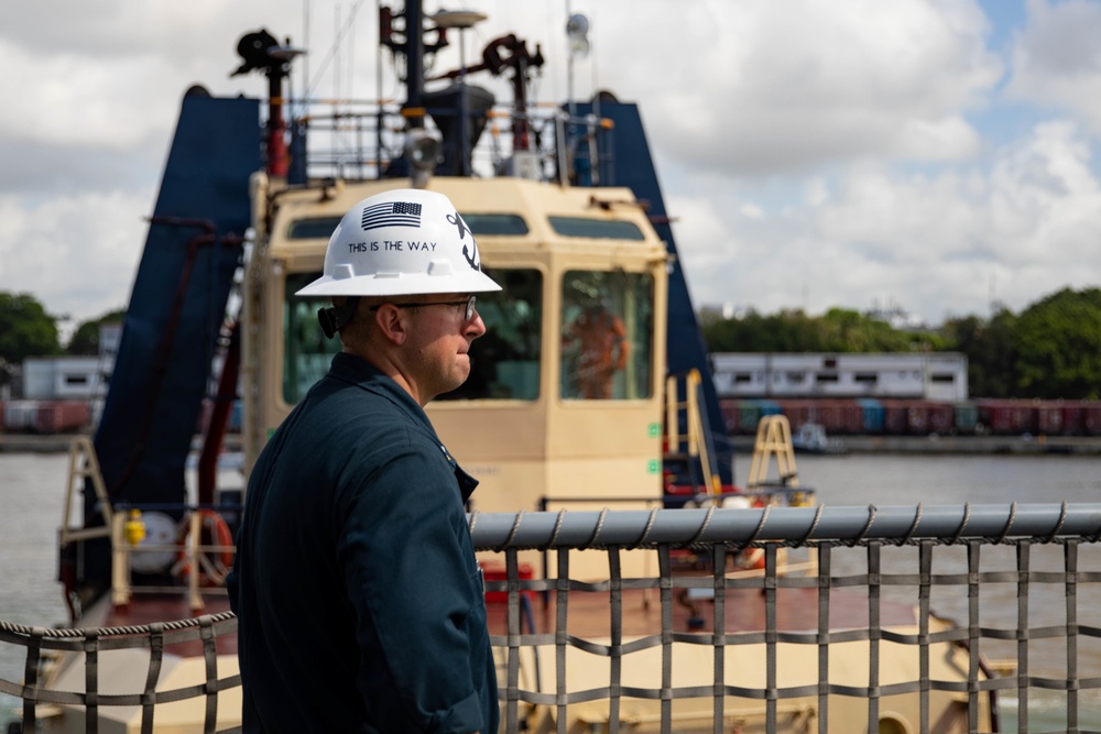 USS Sioux City Sailor Overlooks Sea and Anchor Detail as the Ship Departs Dominican Republic