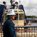 USS Sioux City Sailor Overlooks Sea and Anchor Detail as the Ship Departs Dominican Republic