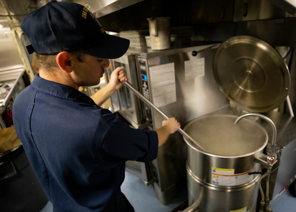 USS Sioux City Sailor Prepares Lunch in the Galley