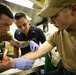 USS Sioux City Sailor Conducts Emergency Response Team Member Training on Ship