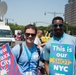 Healthcare Workers with NYC Vaccination Signs