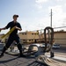USS Sioux City Sailor Heaves Lines as the Ship Arrives to Naval Station Guantanamo Bay