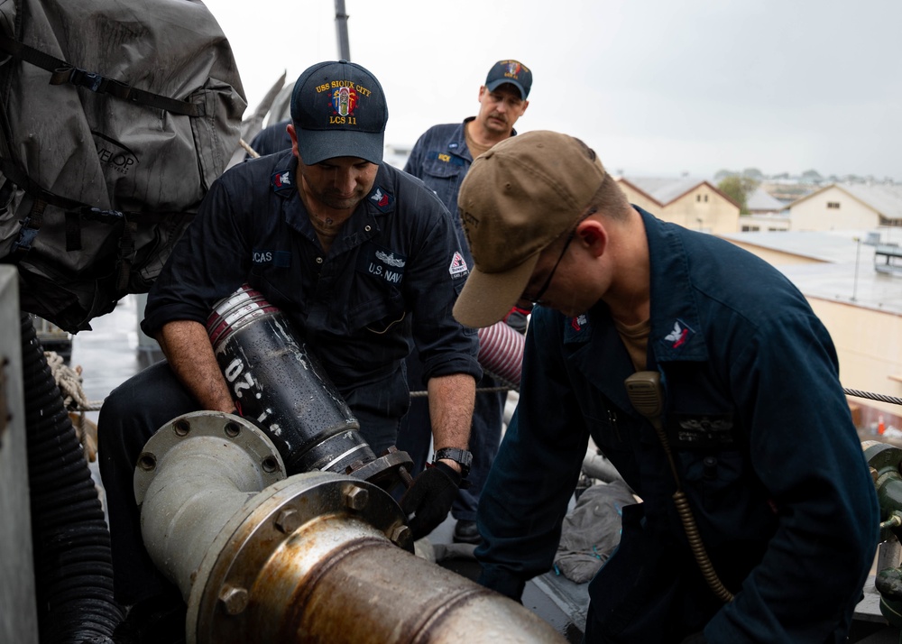 USS Sioux City Sailors Prepare to Refuel the Ship While in Port Naval Station Guantanamo Bay