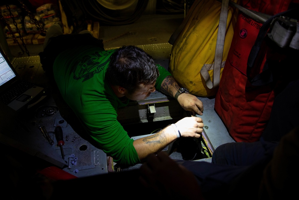 HSC 22 Sailor Conducts Maintenance on a Cargo Hook on an MH-60S Seahawk Helicopter