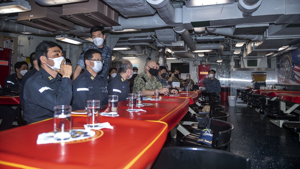 Representatives from the Japan Maritime Self Defense Force, Royal Australian Navy and Republic of Korean Navy meet aboard USS Rafael Peralta (DDG 115)