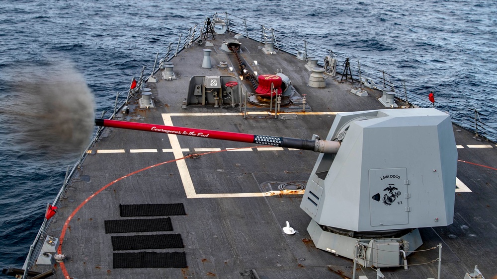 USS Rafael Peralta (DDG 115) fires its 5-inch gun during exercise Pacific Vanguard 2021