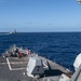 USS Rafael Peralta (DDG 115) sails in formation with Royal Australian Navy Hobart-class guided-missile destroyer HMAS Brisbane (DDG 41)