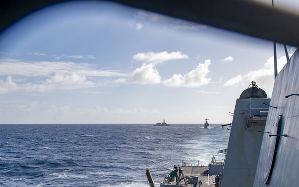 USS Rafael Peralta (DDG 115) sails in formation Republic of Korea (ROK) Navy Chungmugong Ti Sun-sin class destroyer ROKS Wang Geon (DDH 978) and Japan Maritime Self Defense Force Takanami-class destroyer JS Makinami (DD 112)