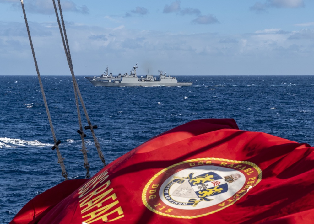 USS Rafael Peralta (DDG 115) sails in formation