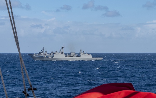 USS Rafael Peralta (DDG 115) sails in formation