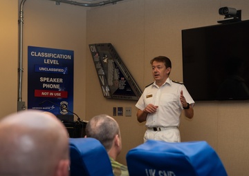 Royal Navy Commodore Phillip D. Nash presents the Britannia Award to 1stLt Benjamin Felhofer