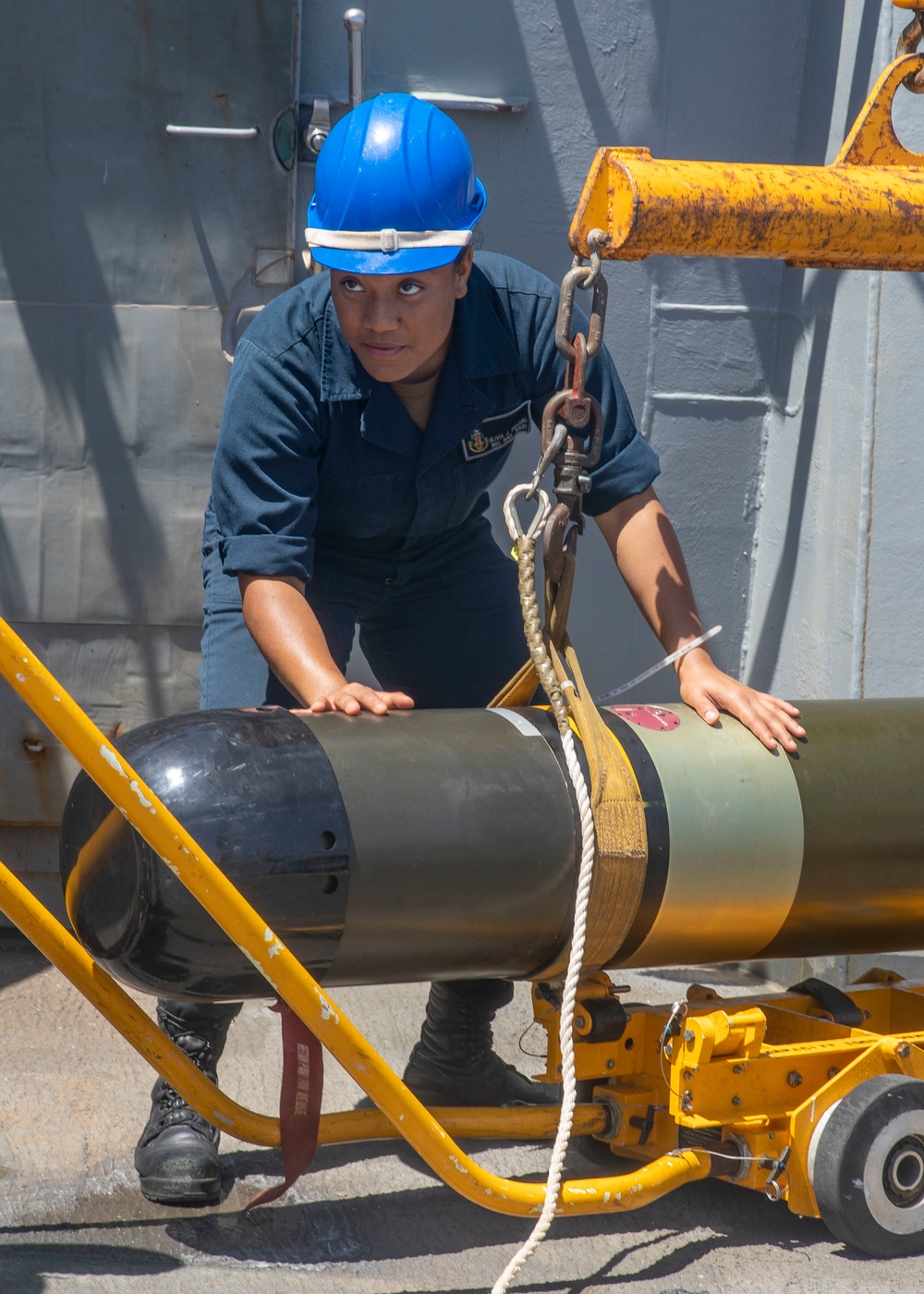 Sailor Transports Torpedo