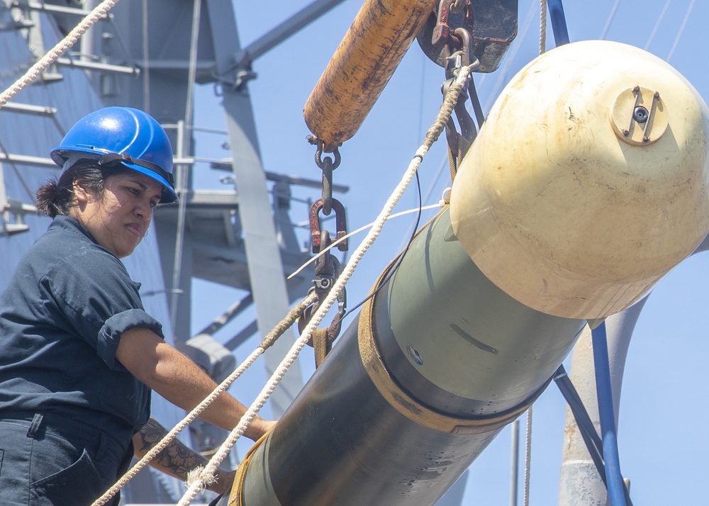Sailor Transports Torpedo
