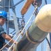 Sailor Transports Torpedo